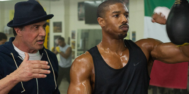This photo provided by Warner Bros. Pictures shows Michael B. Jordan, right, as Adonis Johnson and ...