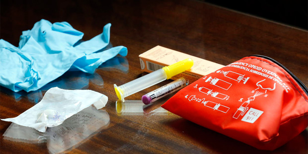 The contents of an emergency opioid overdose kit is seen at the statehouse Tuesday Sept. 29, 2015 i...