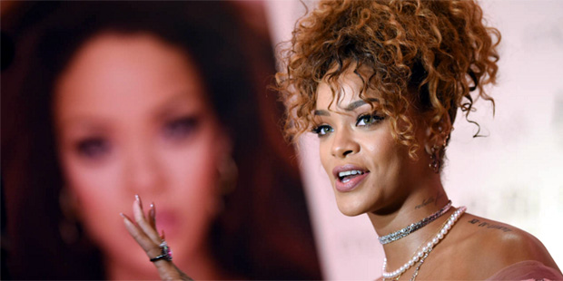 Singer Rihanna attends the "RiRi by Rihanna" fragrance launch at Macy's on Monday, Aug. 31, 2015, i...