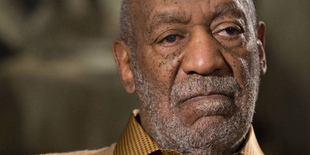 FILE - In this Nov. 6, 2014 file photo, entertainer Bill Cosby pauses during an interview in Washin...