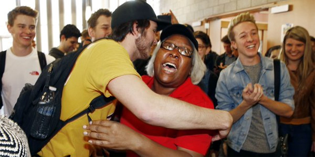 Vicke Davis, right, gets hugged by a student in Barrett, The Honors College at Arizona State Univer...