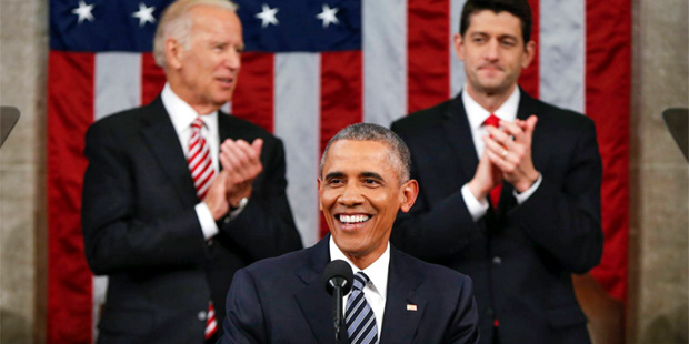 Vice President Joe Biden and Speaker Paul Ryan of Wisconsin applaud President Barack Obama during t...