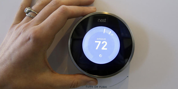 The Nest Learning Thermostat is on display following a news conference Wednesday, June 17, 2015, in...