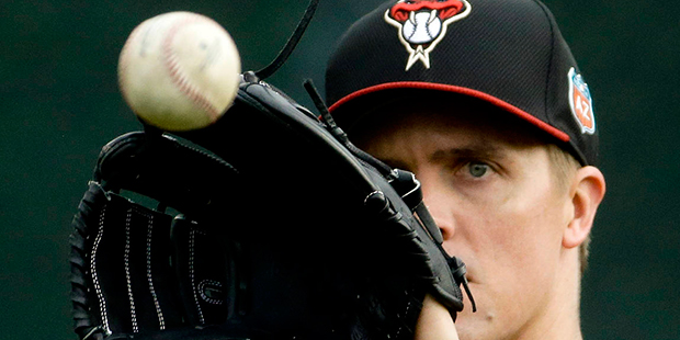 Arizona Diamondbacks pitcher Zack Greinke catches a ball during a spring baseball practice in Scott...