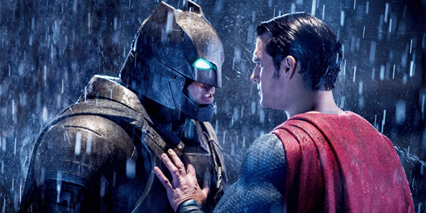 This image released by Warner Bros. Entertainment shows Ben Affleck as Batman, left, and Henry Cavi...