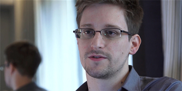 This photo provided by The Guardian Newspaper in London shows Edward Snowden, who worked as a contr...