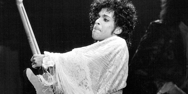 In this Dec. 25, 1984 photo, Prince performs at St. Paul Civic Center in St. Paul, Minn. Prince, wi...