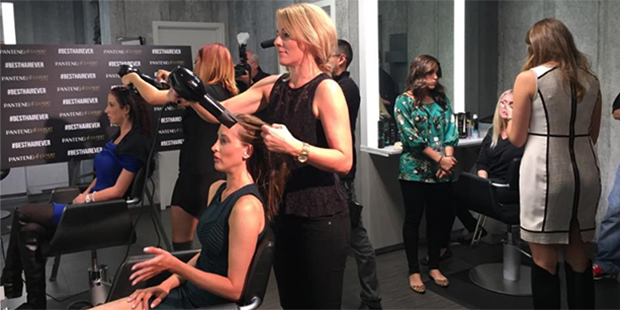 Customers get haircuts and hairstyles by hairdressers at Mane Attraction Salon in Phoenix. (Faceboo...