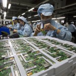 
              In this Tuesday, Nov. 10, 2015, photo, a worker assembles electronic devices at an Alco Electronics factory in Houjie Town, Dongguan City, in the Guangdong province of China. A look inside the factory shows what it takes to succeed as a maker of gadgets for the rest of the world: Human precision in tiny tasks, increasingly automated manufacturing, but also flexible thinking and perks to keep the best employees. (AP Photo/Ng Han Guan)
            
