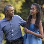 FILE - In this Aug. 23, 2015 file photo, President Barack Obama and his daughter Malia walk across the South Lawn of the White House in Washington.Malia Obama's high school will have to find another commencement speaker when she graduates this year. Her father, President Barack Obama, says he'll be too emotional to get through a speech without crying. (AP Photo/Carolyn Kaster, File)
