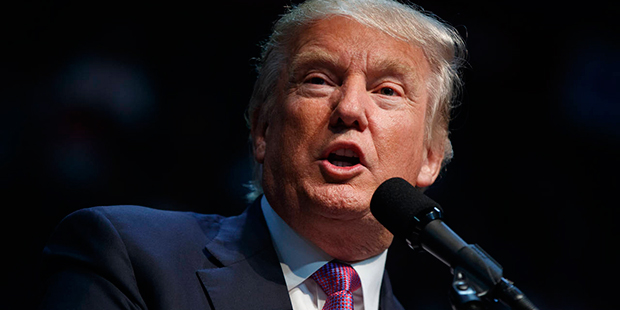 Republican presidential candidate Donald Trump speaks during a campaign rally at Xfinity Arena of E...