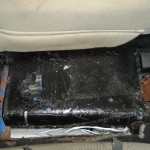 Officers at the DeConcini crossing discovered nearly 39 pounds of cocaine within a suspect vehicle's center hump. (Customs and Border Protection Photo)