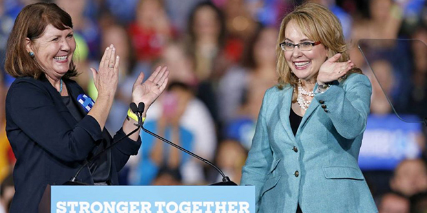 Former Democratic Arizona Rep. Gabrielle Giffords, right, and current Rep. Ann Kirkpatrick, right, ...