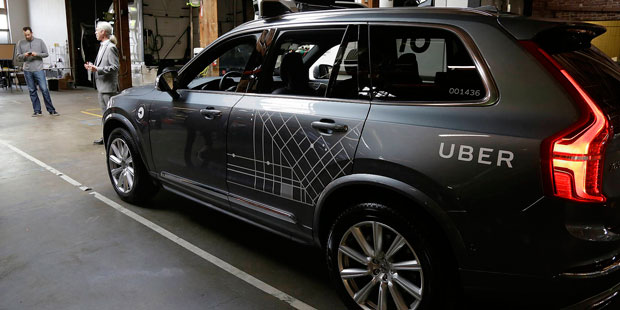 FILE - In this Tuesday, Dec. 13, 2016, file photo, an Uber driverless car is displayed in a garage ...