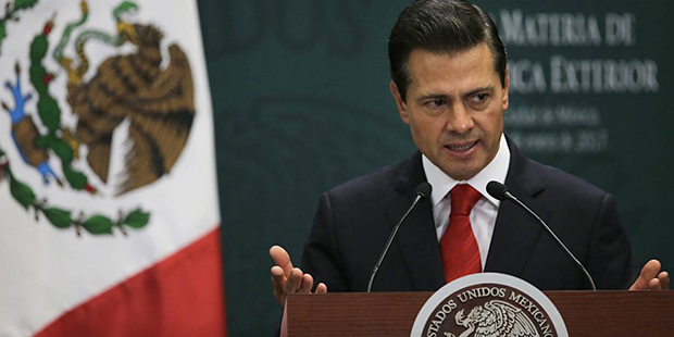 Mexico's President Enrique Pena Nieto speaks during a press conference at Los Pinos presidential re...