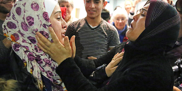 In this Feb. 7, 2017 photo, Baraa Haj Khalaf, left, is greeted by her mother, Fattuom Bakir, after ...