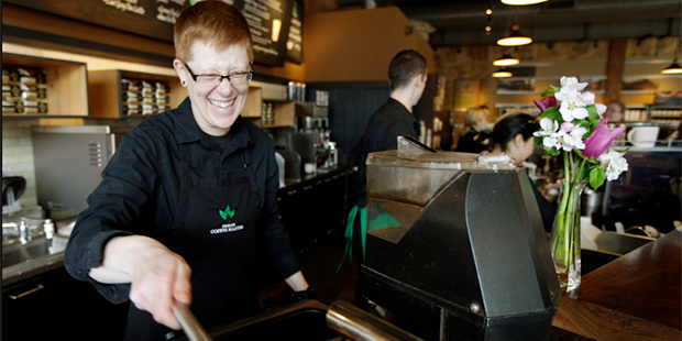 FILE - In this Friday, April 27, 2012 file photo, Starbucks barista Linsey Pringle prepares a cup o...