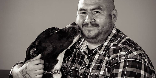 Former Army medic Angel Silva of Phoenix and his dog, Lucky, who he was paired with through Soldier...