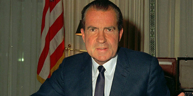 In this Feb. 16, 1969, file photo, President Richard M. Nixon, is shown at his desk in the White Ho...