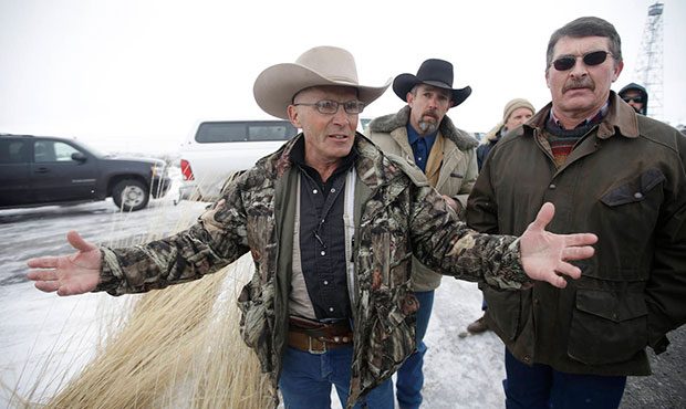 FILE - In this Jan. 9, 2016 file photo, Robert "LaVoy" Finicum, left, a rancher from Arizona, talks...
