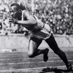 American track and field star Jesse Owens singlehandedly ruined the 1936 Berlin Olympics for Nazi leader Adolf Hitler. Owens won four gold medals at the Games that Hitler announced would prove German superiority. The Games ran from Aug. 1 to Aug. 16. (AP Photo)