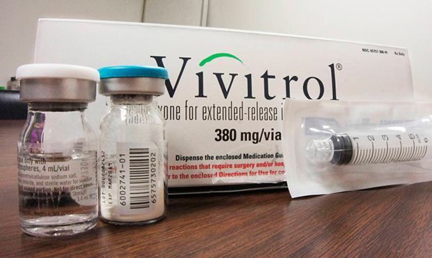 FILE - This Oct. 19, 2016, file photo shows the packaging of Vivitrol at an addiction treatment cen...