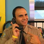 Maricopa County Sheriff Paul Penzone takes calls on the Wells Fargo Phone Bank at the Give-A-Thon for Phoenix Children's Hospital on Aug. 17, 2017 in Phoenix, Ariz. (Matt Layman/KTAR.com)