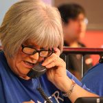 A volunteer takes calls on the Wells Fargo Phone Bank at the Give-A-Thon for Phoenix Children's Hospital on in Phoenix, Ariz. on Aug. 16, 2017. (Matt Layman/KTAR.com)