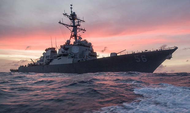 In this Jan. 22, 2017, photo provided by U.S. Navy, the USS John S. McCain conducts a patrol in the...