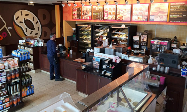 The inside of a Dunkin' Donuts/Baskin-Robbins combo store. (Yelp photo)...