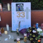 A memorial for Carlos Sanchez is shown outside of Moon Valley High School. (KTAR News Photo/Kathy Cline)