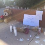 A memorial for Carlos Sanchez is shown outside of Moon Valley High School. (KTAR News Photo/Kathy Cline)