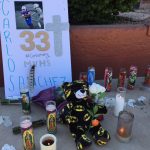 A memorial for Carlos Sanchez is shown outside of Moon Valley High School. (KTAR News Photo/Kathy Cline)