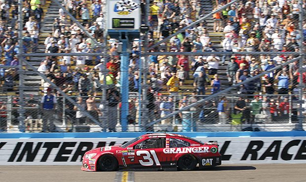 Ryan Newman takes the checkered flag to win the NASCAR Cup Series auto race at Phoenix Internationa...