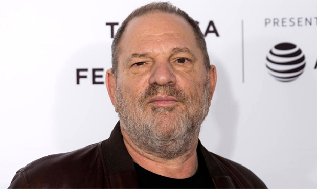 FILE - In this March 2, 2014 file photo, Harvey Weinstein arrives at the Oscars in Los Angeles. Wei...