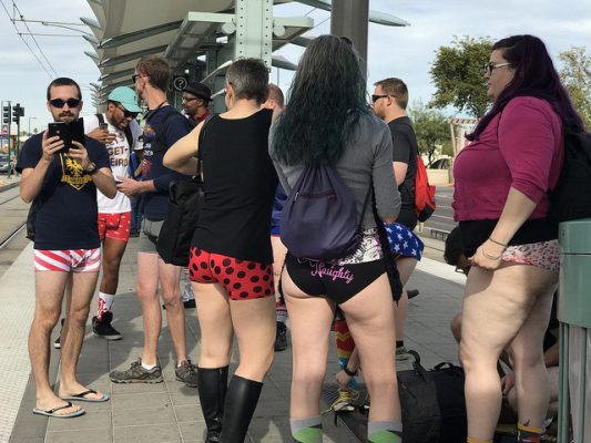 Passengers ride MAX without pants for annual event
