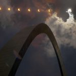 In this multiple exposure photograph, the phases of a partial solar eclipse are seen over the Gateway Arch in St. Louis on Aug. 21, 2017.(AP Photo/Jeff Roberson)