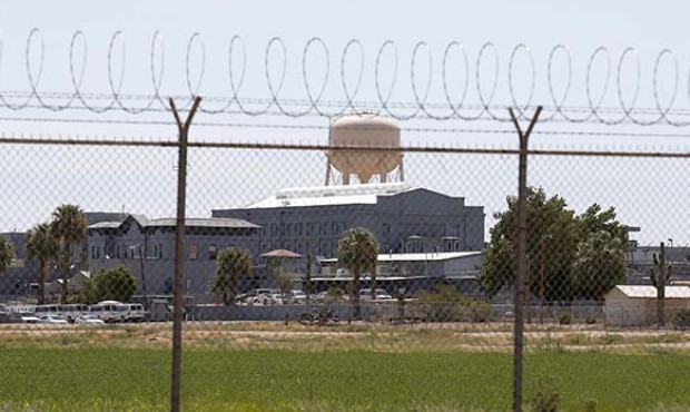 FILE - In this July 23, 2014, file photo, a fence surrounds the state prison in Florence, Ariz. (AP...