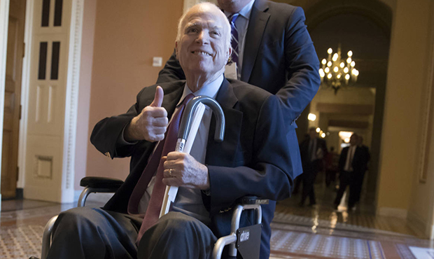 Sen. John McCain, R-Ariz., leaves a closed-door session where Republican senators met on the GOP ef...