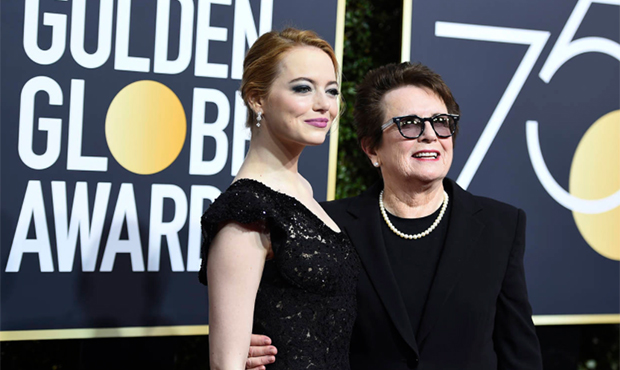 Emma Stone, left, and Billie Jean King arrive at the 75th annual Golden Globe Awards at the Beverly...
