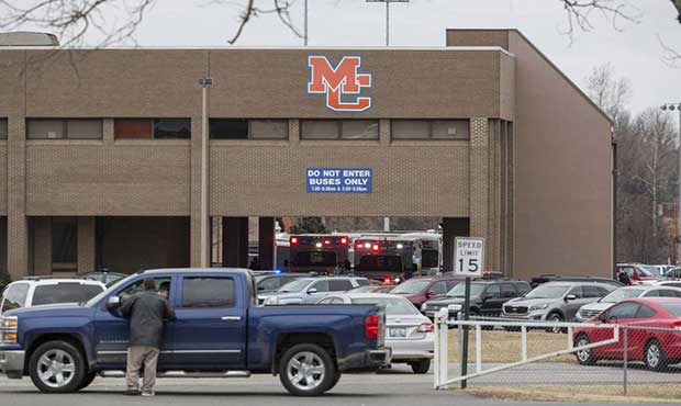 Emergency crews respond to Marshall County High School after a fatal school shooting Tuesday, Jan. ...