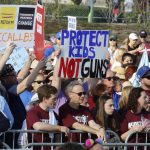Participants gather during the March For Our Lives event Saturday, March 24, 2018, in Parkland, Fla. (AP Photo/Joe Skipper)