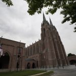 The flags are seen lowered to half-staff during the visitation of former first lady Barbara Bush at St. Martin's Episcopal Church, Friday, April 20, 2018, in Houston. (AP Photo/David J. Phillip)