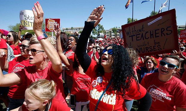 Teachers chant during continued protests at the Arizona Capitol Thursday, May 3, 2018, in Phoenix. ...