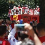 Washington Capitals players, coaches, staff and family members traveled down Constitution Avenue in open-air buses as part of the parade. (Photo by Sarabeth Henne/Cronkite News)