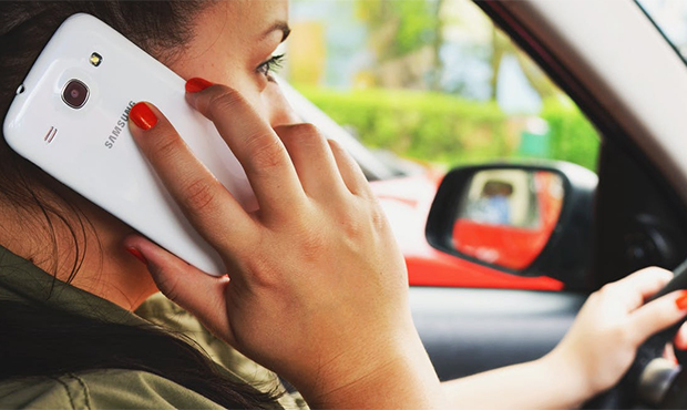 Surprise could soon ban using cell phones while driving