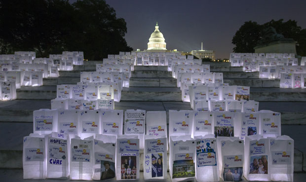 A candlelight vigil, Lights of Hope, sponsored by the American Cancer Society, is assembled near th...