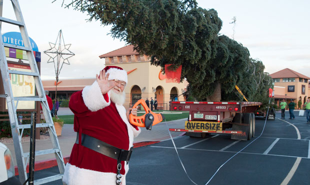 Santa welcomes a giant Christmas tree to the Outlets at Anthem in 2017. (Outlets at Anthem Photo)...