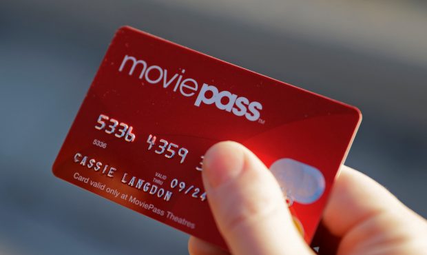 FILE - In this Jan. 30, 2018 file photo, Cassie Langdon holds her MoviePass card outside AMC Indian...