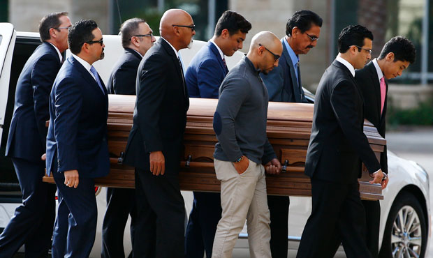 Pallbearers carry the casket of former Democratic U.S. Rep. Ed Pastor into St. Francis Xavier Catho...